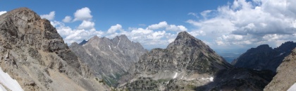A panoramic look out the other side of Paintbrush Divide with a slight view of Jackson Hole valley in the distance.
